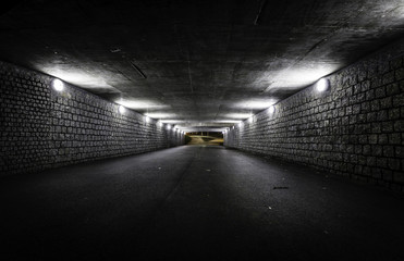 Empty dark tunnel at night - obrazy, fototapety, plakaty
