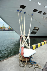 Fototapeta premium Cruise tourist ship and bollard in port of Odessa, Ukraine