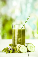 Healthy fresh vegetable juice with cucumbers