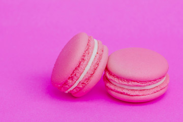 Sweet  french macaroons on retro-vintage background