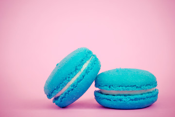 Sweet  french macaroons on retro-vintage background