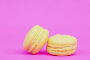 Sweet  french macaroons on retro-vintage background