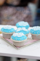 Stylish blue and white cupcakes