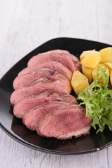 duck sliced and vegetables