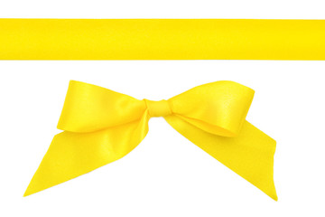 Yellow ribbon with a bow isolated on white background