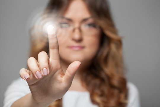 Woman Pressing Touchscreen Button