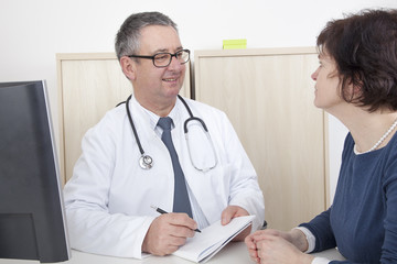 Doctor talking with patient