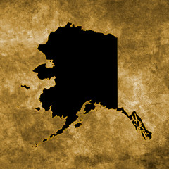 Grunge illustration with the map of Alaska