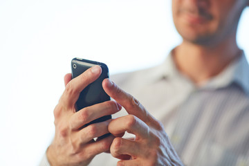 man using mobile phone