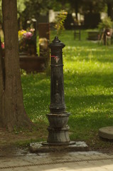 Obraz na płótnie Canvas tap on the cementary - water