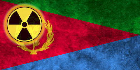 Fototapeta premium Grunge flag background with nuclear sign - Eritrea