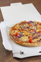 Delivered Pizza in Box