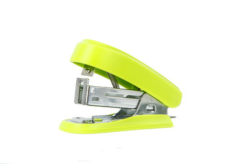 Close up of colorful stapler on white - obrazy, fototapety, plakaty