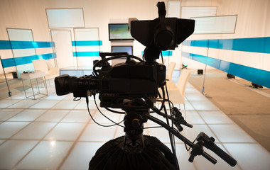 Television studio with camera and lights