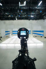 Television studio with camera and lights
