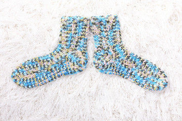 Woolen socks, on color background