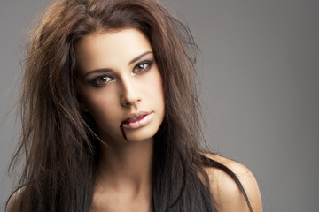 Fototapeta premium woman with blood on her lips