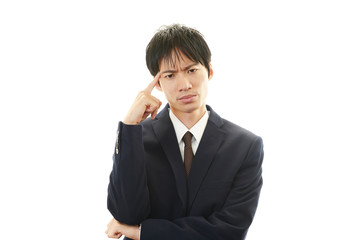 頭痛を訴えるビジネスマン