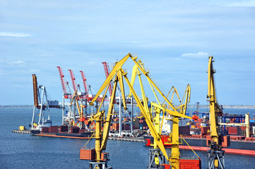 Bulk cargo ship under port crane bridge, Odessa, Ukraine