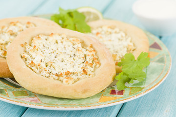Cheese Manakish - Flatbread tooped with cheese.