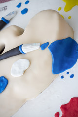 Naklejka premium Cake imitating a painter's palette
