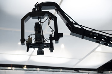 Television studio with jib camera and lights