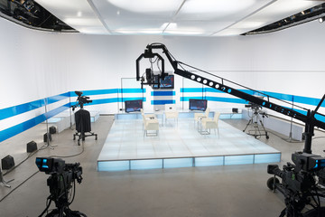 Television studio with jib camera and lights