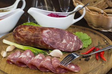 sausage on a wooden plate in a restaurant