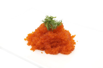 plate with flying fish roe on a white background