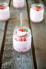 Strawberry mousse with cilantro in the glass jar