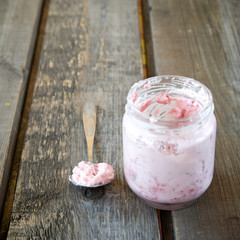 Strawberry mousse with cilantro in the glass jar