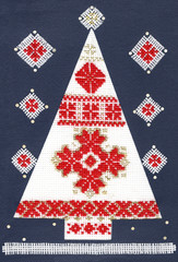 Christmas background with folk embroidery and applique
