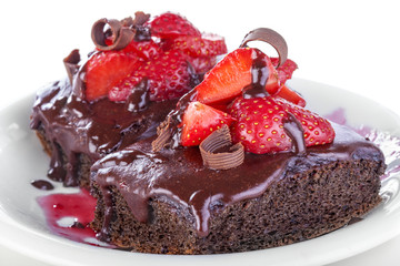 Delicious and sweet chocolate cake with fresh strawberries
