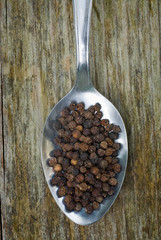 black pepper with spoon