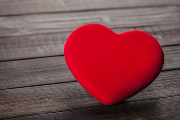Heart shape on wooden table.