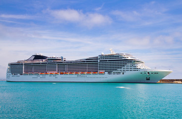 Luxury cruise ship sailing from port 