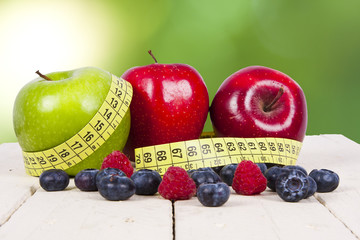 fresh fruit with measuring cintra concept of healthy diet