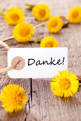 Naklejka premium Yellow Flowers with Danke