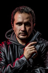 Private detective with leather jacket and gun, inspector