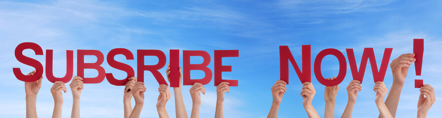 People Holding Subscribe Now in the Sky