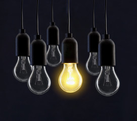 Light bulb lamps on black background