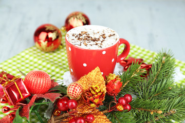 Hot chocolate with cream in color mug,