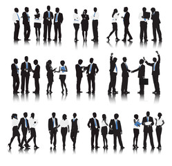 Silhouettes of Business People in a Row Working