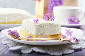 Delicious dessert with lilac flowers