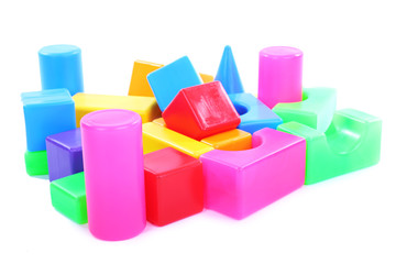 Colorful plastic toys isolated on white