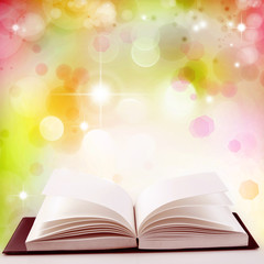 Open book and magical background