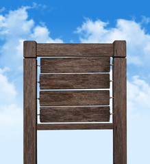 wood sign with blue sky 