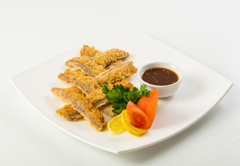 Sliced fish sticks and souce
