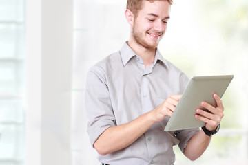 businessman using tablet pc on white background