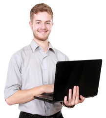 Young businessman using laptop pc on white